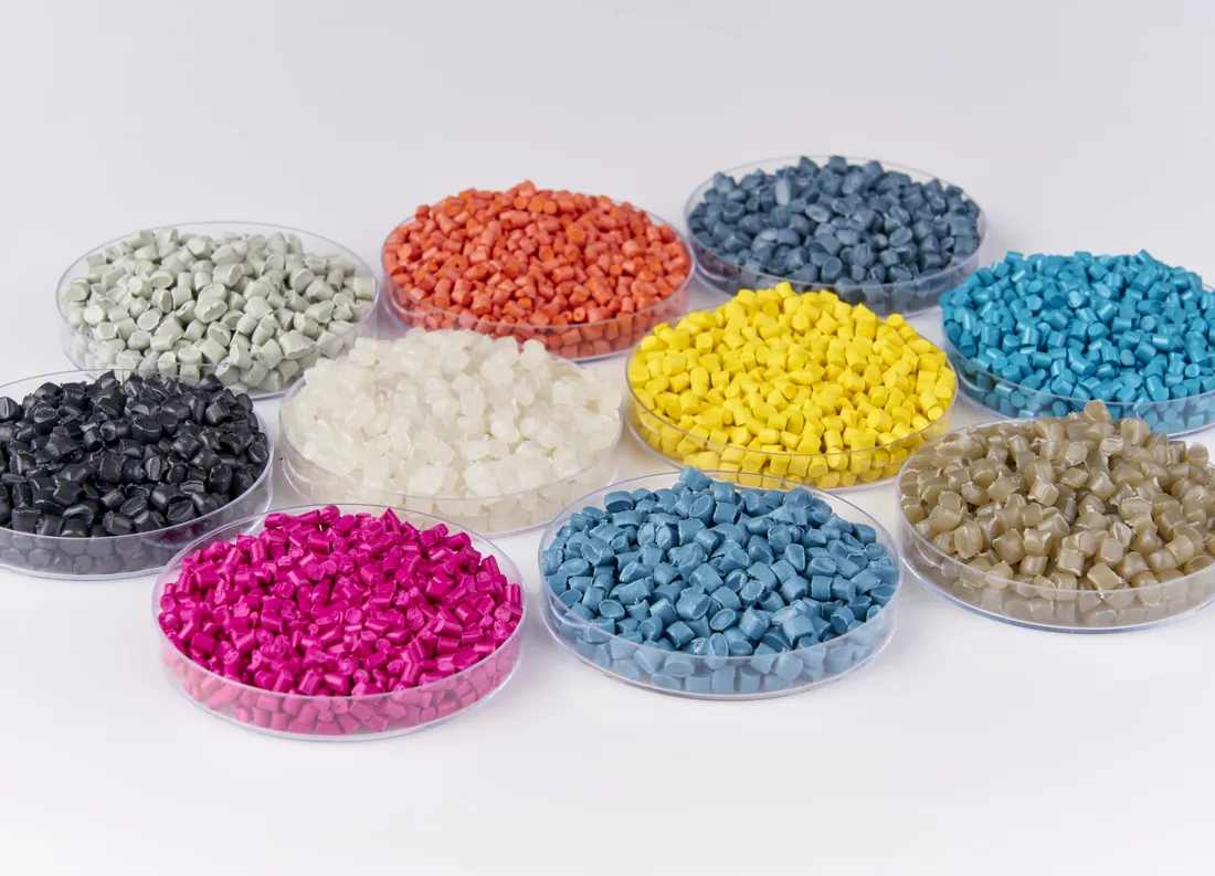 Dishes of recycled polythene pellets in eight colours